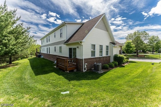 109 Samson Dr, Raritan Twp, NJ 08822 - view of home's exterior with brick siding, a lawn, a deck, central air condition unit, and roof with shingles