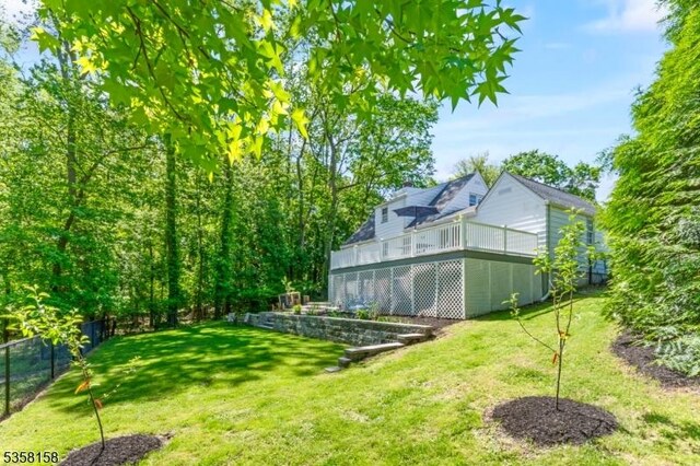 view of yard featuring a deck