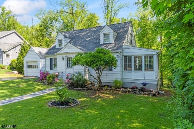 cape cod-style house with a front lawn and an attached garage