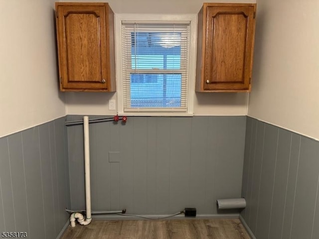 7 Cleveland Ave, Victory Gardens Boro, NJ 07801 - laundry room featuring wainscoting and wood finished floors