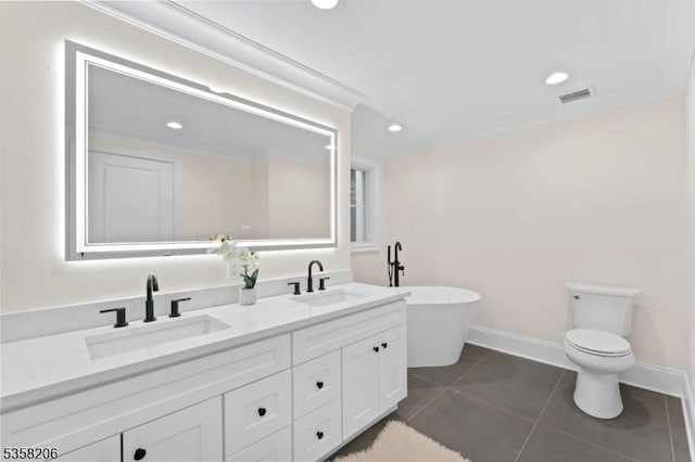 bathroom with double vanity, tile patterned flooring, a soaking tub, recessed lighting, and ornamental molding