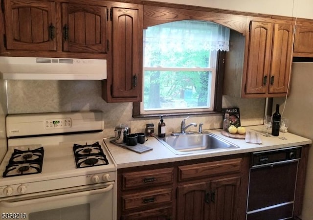 18 Cray Ter, Fanwood Boro, NJ 07023 - kitchen featuring white range with gas stovetop, under cabinet range hood, dishwasher, a sink, and light countertops