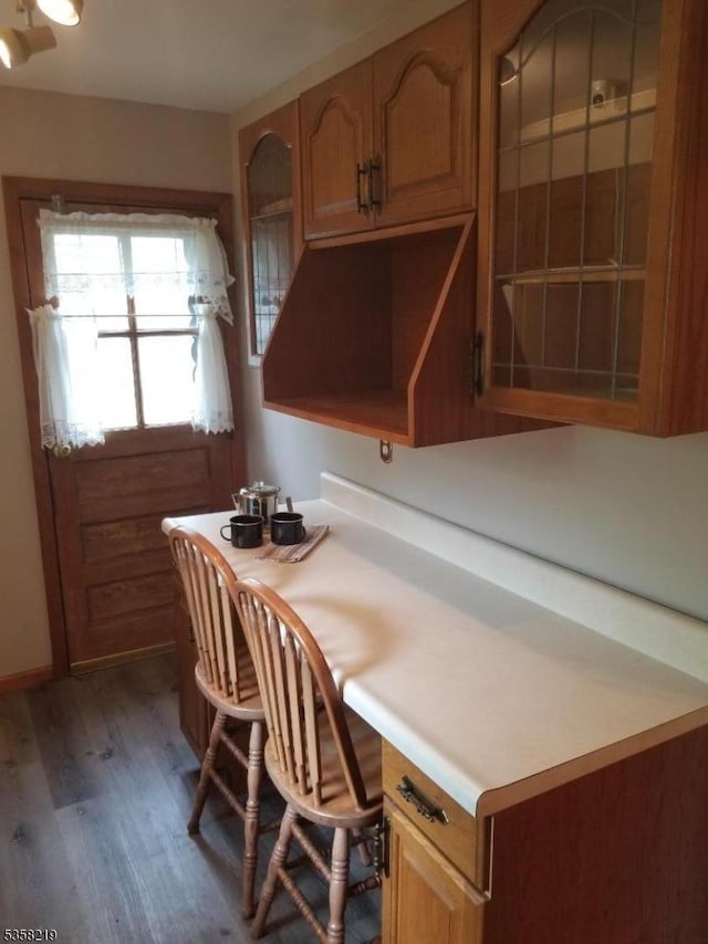 18 Cray Ter, Fanwood Boro, NJ 07023 - kitchen with wood finished floors, light countertops, and brown cabinetry