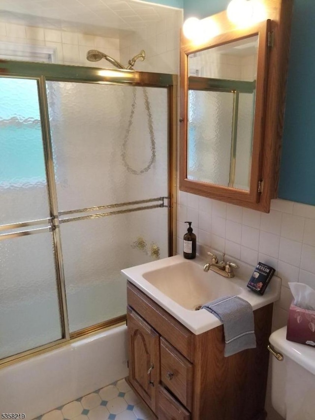 18 Cray Ter, Fanwood Boro, NJ 07023 - full bath with vanity, shower / bath combination with glass door, toilet, tile walls, and tasteful backsplash