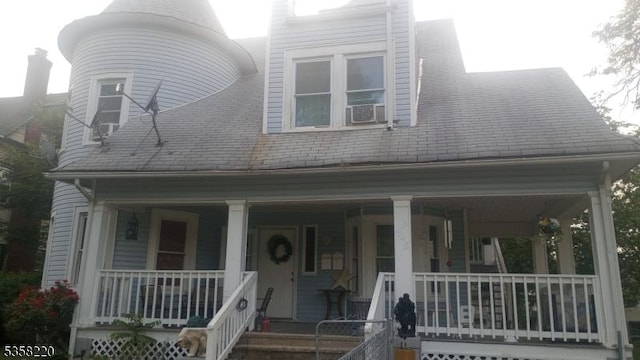 946 W 7th St, Plainfield City, NJ 07063 - view of front of home featuring a porch and cooling unit