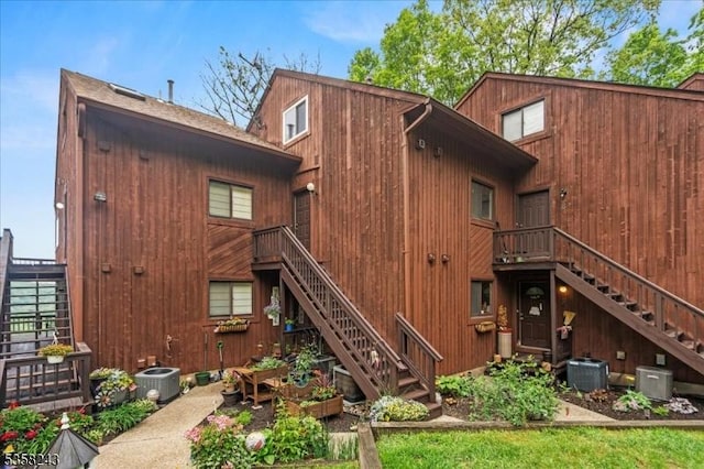 3 Telemark Dr Unit 10, Vernon Twp, NJ 07462 - rear view of house featuring stairway, central AC unit, and a deck