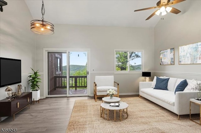3 Telemark Dr Unit 10, Vernon Twp, NJ 07462 - living room featuring plenty of natural light, wood finished floors, high vaulted ceiling, ceiling fan, and baseboards