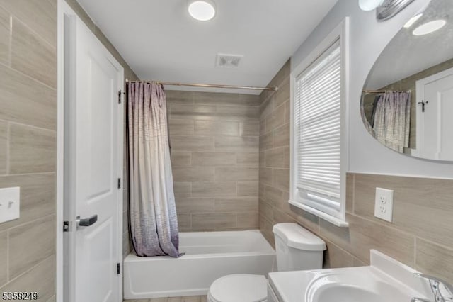 227 N Center St, City Of Orange Twp, NJ 07050 - full bath with tile walls, toilet, shower / bath combo, and vanity