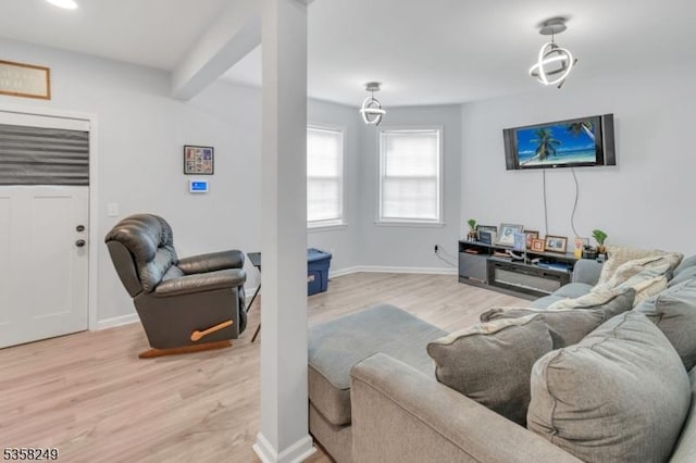 227 N Center St, City Of Orange Twp, NJ 07050 - living room with light wood finished floors and baseboards