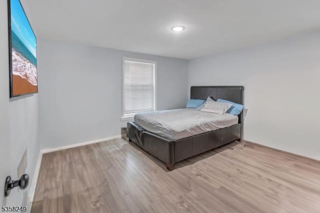 227 N Center St, City Of Orange Twp, NJ 07050 - bedroom featuring wood finished floors and baseboards