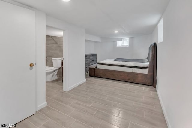 227 N Center St, City Of Orange Twp, NJ 07050 - bedroom with recessed lighting, baseboards, connected bathroom, and light wood-type flooring