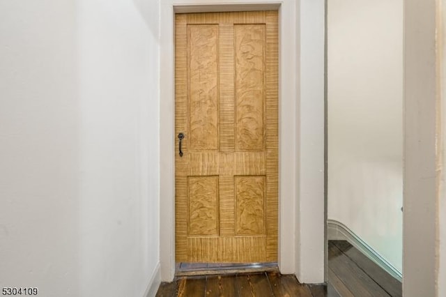 detailed view of wood finished floors and baseboards