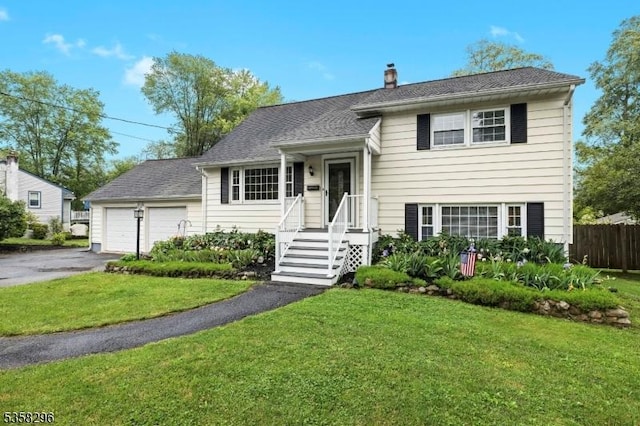 25 Hunter St, Roxbury Twp, NJ 07876 - split level home featuring driveway, a chimney, and a garage
