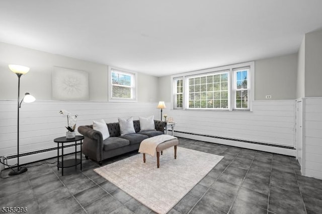 25 Hunter St, Roxbury Twp, NJ 07876 - living room with a baseboard heating unit, a wainscoted wall, and wooden walls
