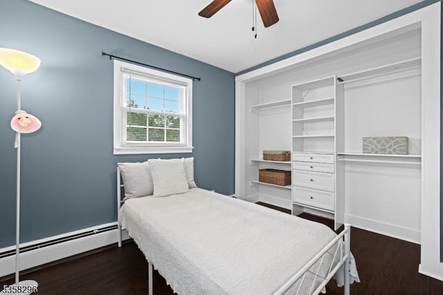 25 Hunter St, Roxbury Twp, NJ 07876 - bedroom with a baseboard heating unit, wood finished floors, and ceiling fan