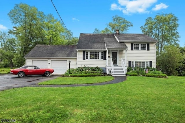 25 Hunter St, Roxbury Twp, NJ 07876 - split level home with driveway, a garage, a front lawn, and a chimney