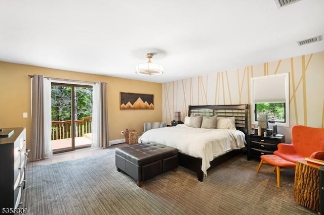 67 Brookwood Rd, Byram Twp, NJ 07874 - bedroom with access to outside and wallpapered walls