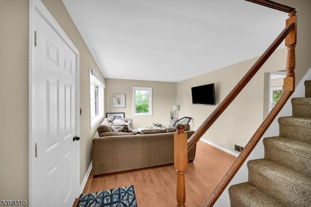 104 Lake Park Ter, West Milford Twp, NJ 07421 - living area featuring stairs, light wood-type flooring, and baseboards