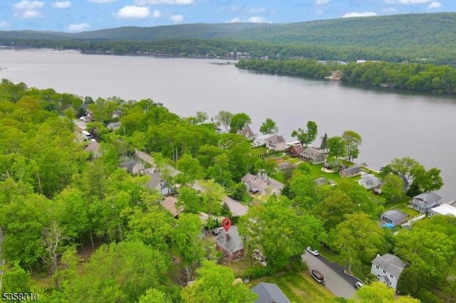 104 Lake Park Ter, West Milford Twp, NJ 07421 - aerial perspective of suburban area with a heavily wooded area and a nearby body of water