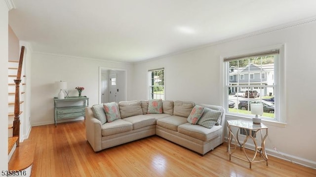 126 Wells St, Westfield Town, NJ 07090 - living area featuring healthy amount of natural light, light wood-type flooring, crown molding, and baseboards