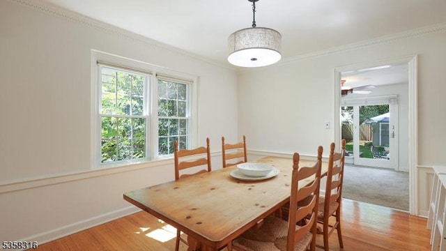 126 Wells St, Westfield Town, NJ 07090 - dining space with light wood-style floors, ornamental molding, baseboards, and ceiling fan
