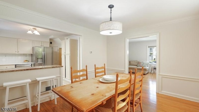 126 Wells St, Westfield Town, NJ 07090 - dining room featuring light wood-style floors and crown molding