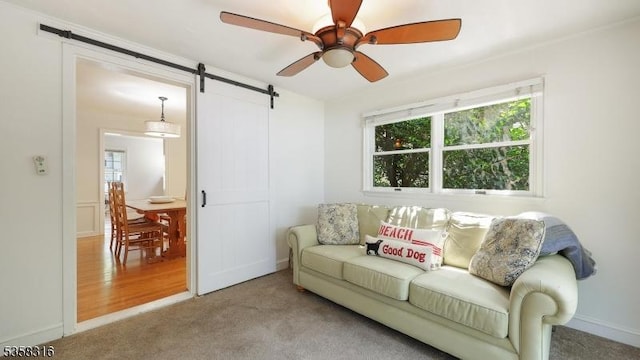 126 Wells St, Westfield Town, NJ 07090 - living room featuring a barn door, ceiling fan, plenty of natural light, and carpet
