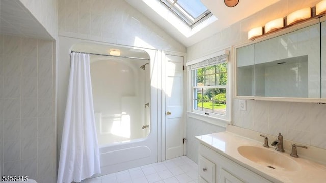 126 Wells St, Westfield Town, NJ 07090 - full bath featuring a skylight, vanity, shower / bath combo, tile patterned flooring, and vaulted ceiling