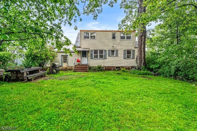 801 Clark St, Linden City, NJ 07036 - rear view of property featuring a yard