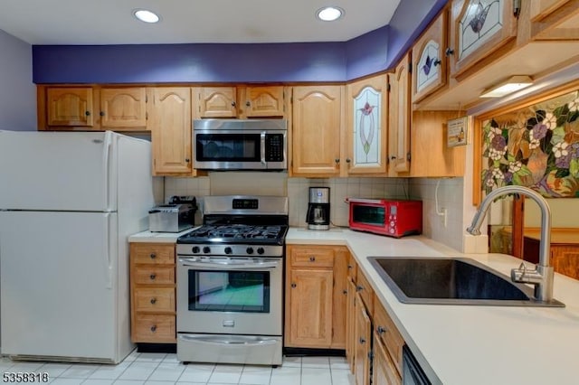 79 Boulder Run Rd, Paterson City, NJ 07501 - kitchen featuring stainless steel appliances, a sink, light countertops, backsplash, and recessed lighting