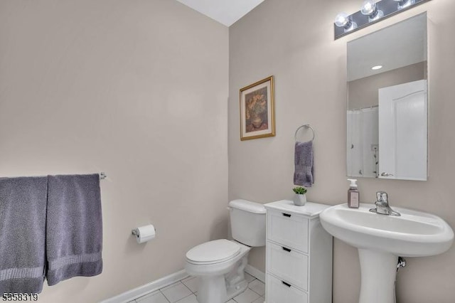 2303 Ambassador Ct Unit 2303, Franklin Twp, NJ 08873 - bathroom with tile patterned flooring, baseboards, and toilet