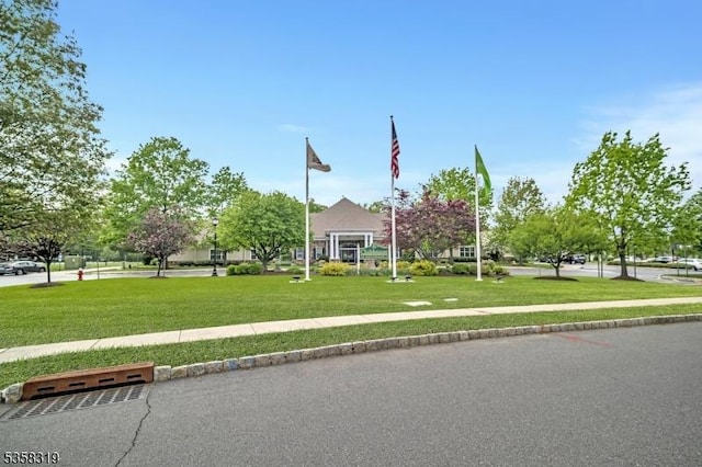 2303 Ambassador Ct Unit 2303, Franklin Twp, NJ 08873 - obstructed view of property with a front lawn