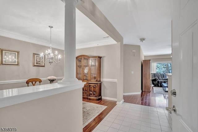 2303 Ambassador Ct Unit 2303, Franklin Twp, NJ 08873 - corridor with ornate columns, wood finished floors, ornamental molding, and baseboards
