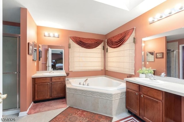 692 Skyline Dr, Jefferson Twp, NJ 07849 - bathroom with a shower stall, a bath, and two vanities
