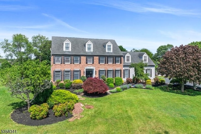45 Wagner Ln, Hillsborough Twp, NJ 08844 - view of front of house with a front yard and brick siding