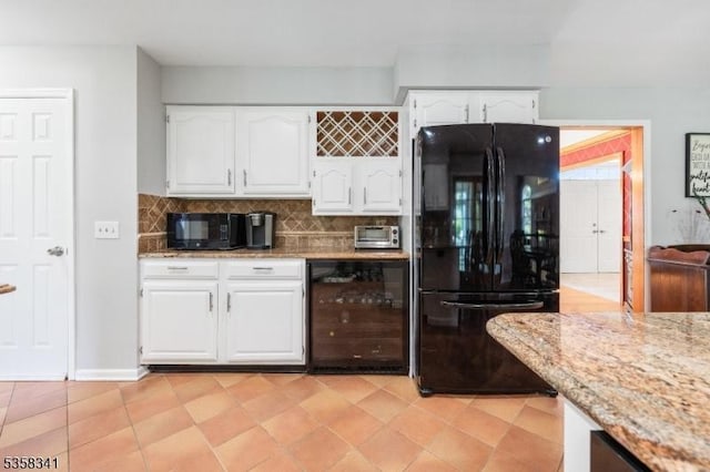 45 Wagner Ln, Hillsborough Twp, NJ 08844 - kitchen featuring black appliances, wine cooler, light stone countertops, and white cabinetry