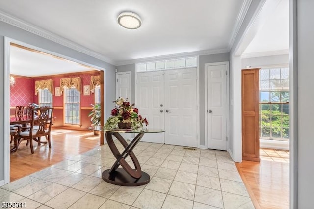45 Wagner Ln, Hillsborough Twp, NJ 08844 - foyer featuring ornamental molding, baseboards, and light tile patterned flooring