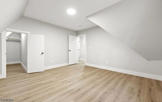 104 Hollywood Ave, East Orange City, NJ 07018 - additional living space featuring vaulted ceiling, light wood-style flooring, and baseboards