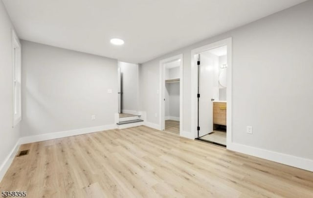 104 Hollywood Ave, East Orange City, NJ 07018 - unfurnished bedroom featuring light wood-type flooring, recessed lighting, baseboards, and a spacious closet