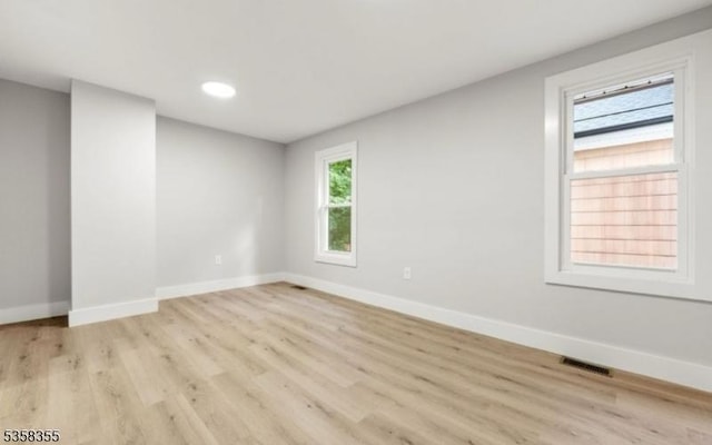 104 Hollywood Ave, East Orange City, NJ 07018 - empty room with light wood finished floors, baseboards, and recessed lighting