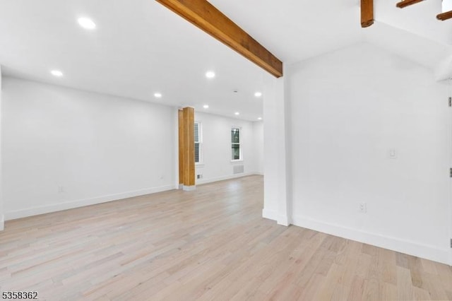 unfurnished living room featuring light wood-style flooring, recessed lighting, and baseboards
