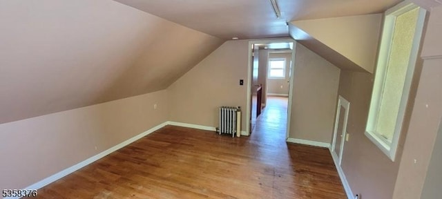 15 Fairfield Ave, Mine Hill Twp, NJ 07801 - bonus room with radiator, wood finished floors, vaulted ceiling, and baseboards