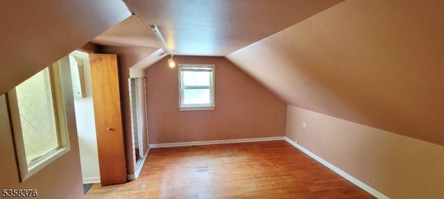15 Fairfield Ave, Mine Hill Twp, NJ 07801 - bonus room featuring wood finished floors, baseboards, and vaulted ceiling