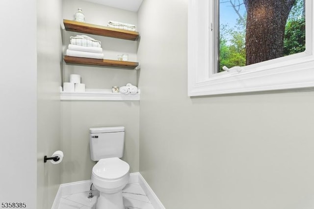 926 Cedar Dr, Stillwater Twp, NJ 07860 - bathroom with toilet, baseboards, and marble look tile flooring