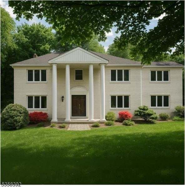 1601 Justin Pl, Mountainside Boro, NJ 07092 - view of front facade with a front yard