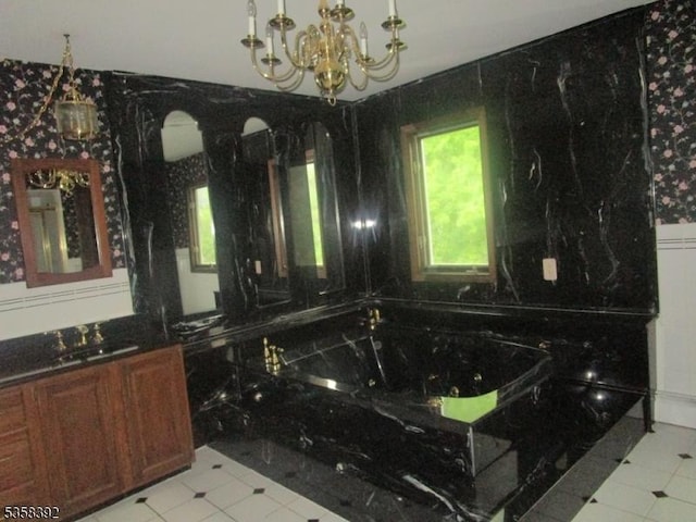 1601 Justin Pl, Mountainside Boro, NJ 07092 - full bathroom featuring a chandelier, vanity, and a tub with jets