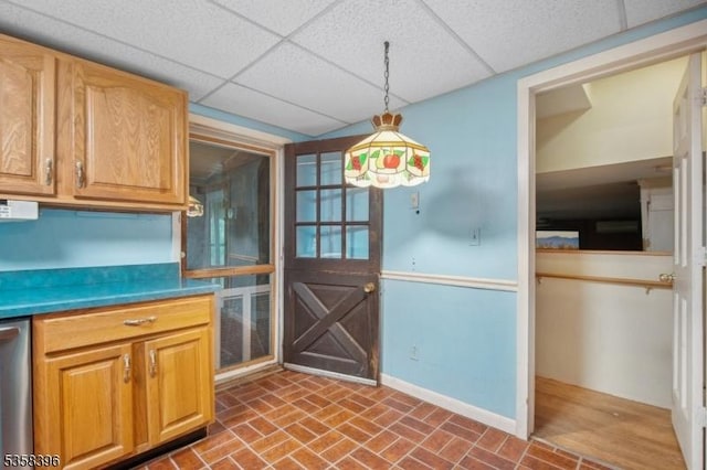 91 Hillcrest Rd, Warren Twp, NJ 07059 - kitchen with a paneled ceiling, baseboards, decorative light fixtures, dishwasher, and brick patterned floors