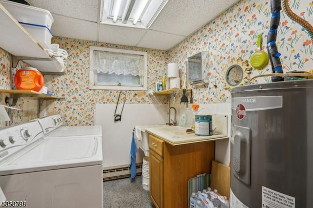 clothes washing area featuring water heater, washer and dryer, wallpapered walls, and a baseboard heating unit