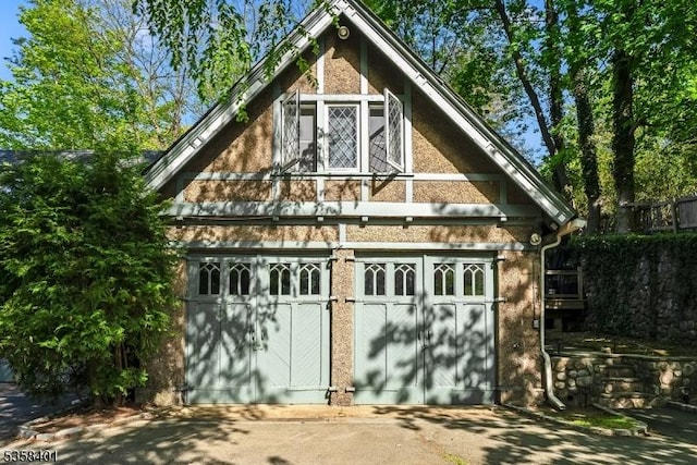 view of outbuilding featuring a garage