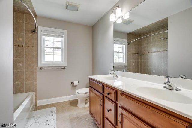 9 Colgate Ct, Franklin Twp, NJ 08873 - bathroom featuring toilet, tile patterned flooring, double vanity, baseboards, and shower / tub combination